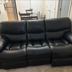 Basically new Black 89 Inch Power Reclining Sofa