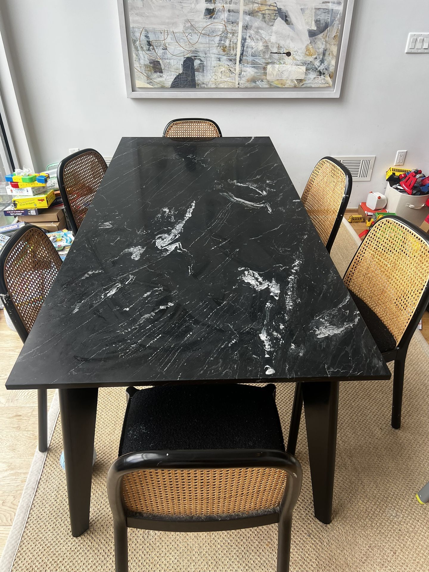 CB2 Black Marble Dining Table + 6 Cane Chairs — $1,800