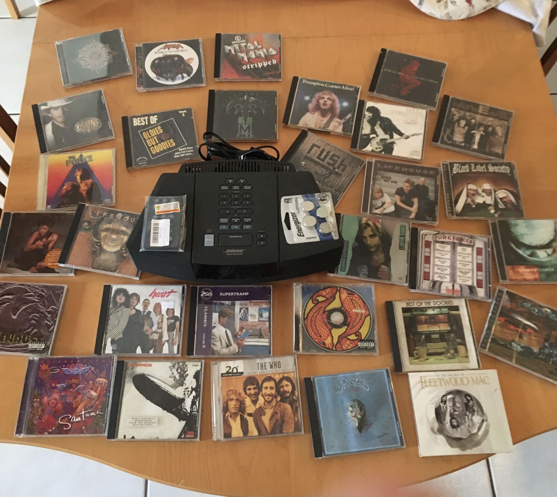 Bose Wave Radio / CD player / Alarm Clock NEW REMOTE & Batteries PLUS (30) Rock CDs Some of the greatest from the 70s TESTED 100% WORKING Excellent C