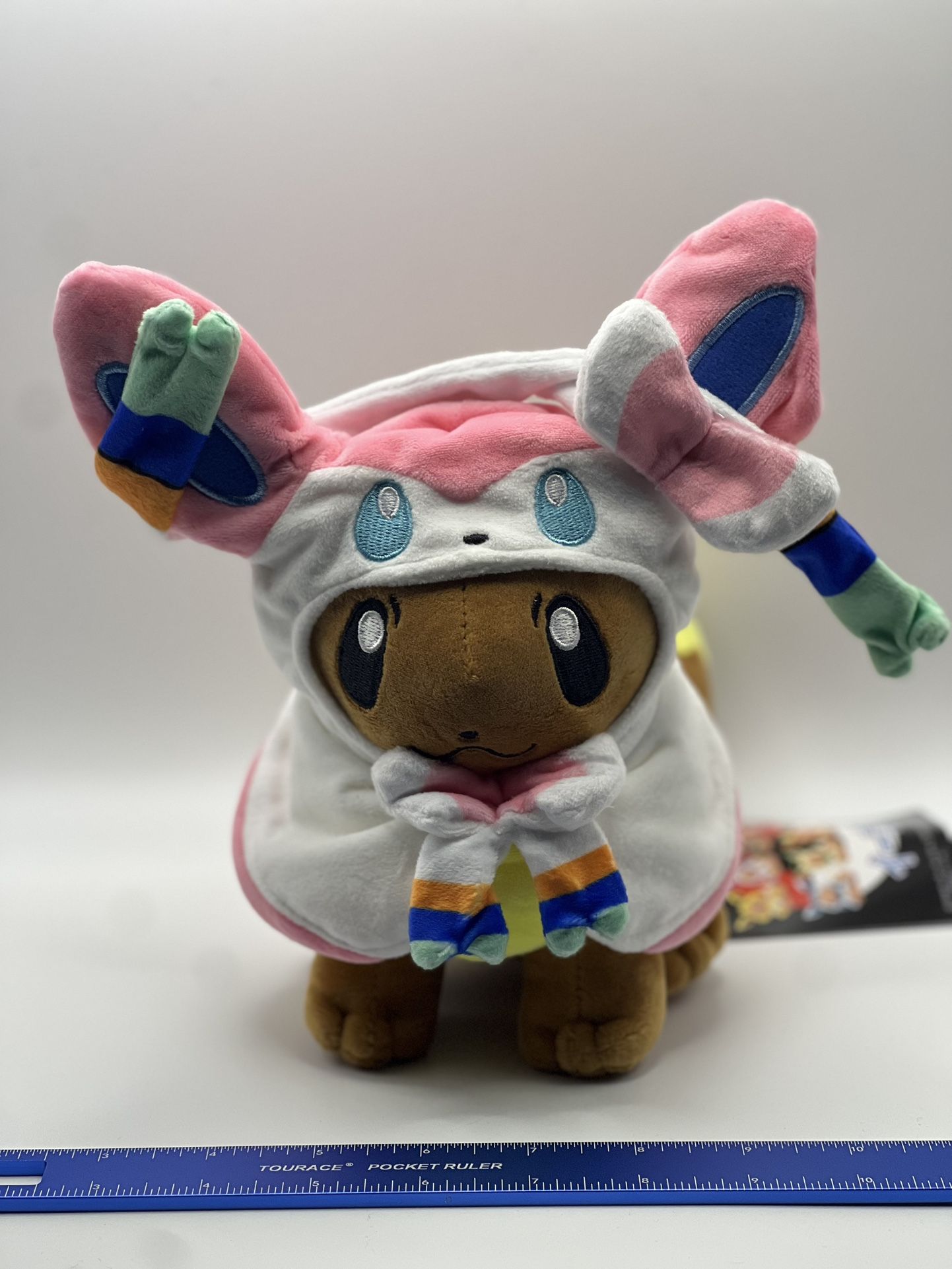 Eevee - Sylveon Poncho Pokémon Plush 8”