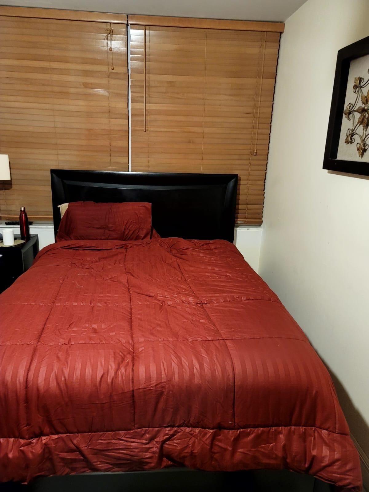 Queen size wood bed frame.