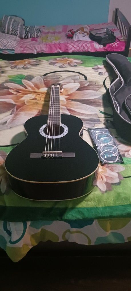 Acoustic Guitar used very little, excellent condition for those who can give it proper use.