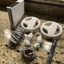 Nintendo Wii Bundle – 2 Remotes, Nunchucks, Steering Wheels – Works Great!