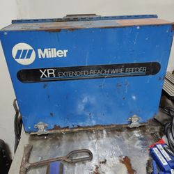 Miller Extended Reach Wire Feeder And Spoolmatic 3 Welding Gun And Dimmable Welding Mask And Gas Canister