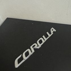 OEM USED EMBLEM BADGE REAR LETTERS LUGGAGE PLATE TOYOTA COROLLA 20-2025
