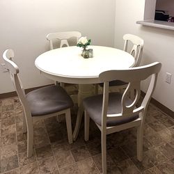 Dining table and chairs set