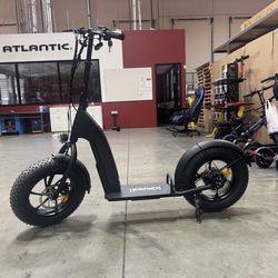 Electric scooter with large tires