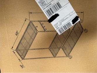 Unopened black wire garment rack