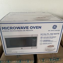 GE Compact Microwave - 0.7 Cu. Ft. Stainless Steel Brand New