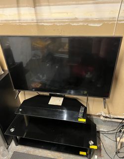 Tv stand and tv.