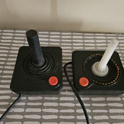 vintage Atari CX40 joysticks, which were the primary controllers for the Atari 2600 game console - Not Sure If They Work