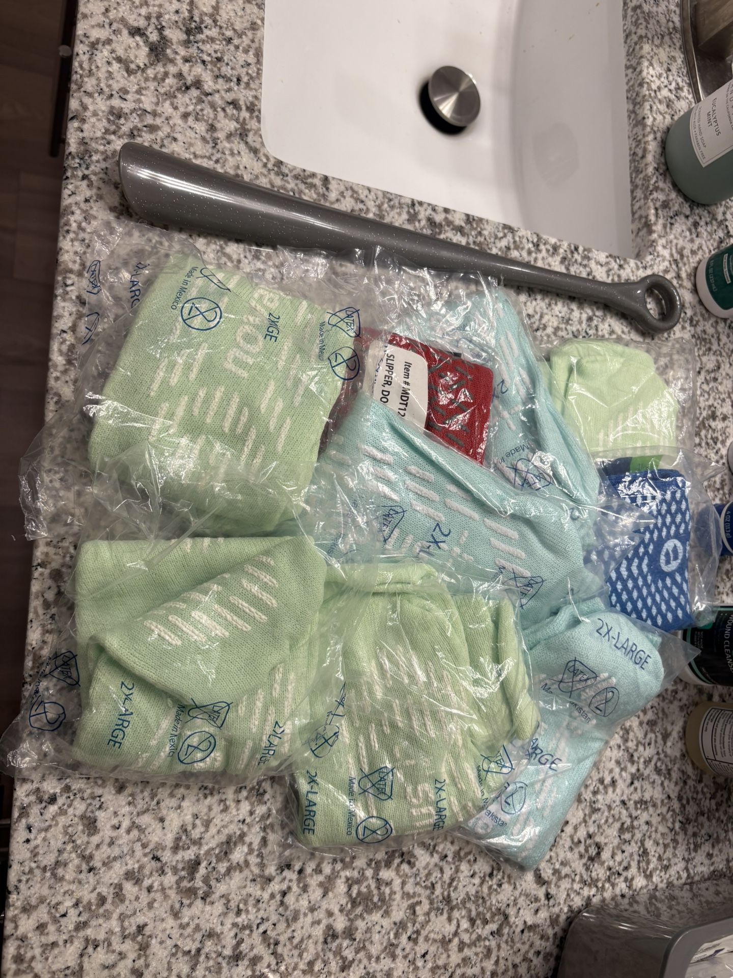 FREE - Shoe Horn, Hospital Grippy Socks, Size 3 Swimmer Diapers. 