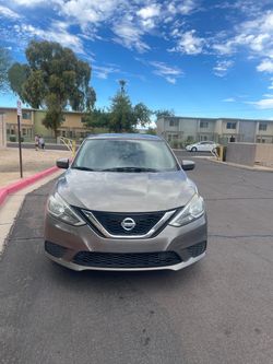 2017 (gray) Nissan Sentra SV
