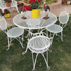 Sweet Vintage Bistro Patio Parlour Table and 4 Chairs Wrought Iron  Heavy Duty Good Condition For Age On The Smaller Size Scale 