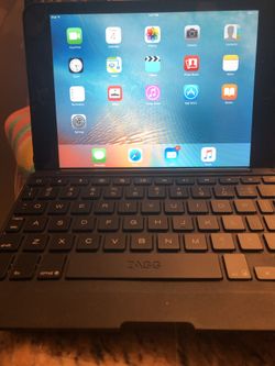 LOCKED. Apple Ipad. With zagg key board