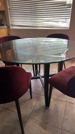 Glass table round with wood legs velvet chairs