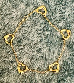 TIFFANY’S Elsa Peretti® Open Heart Collection