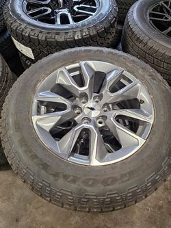 BRAND NEW CHEVY SILVERADO WHEELS WITH NEW GOODYEAR WRANGLER AT TIRES 275/60R20