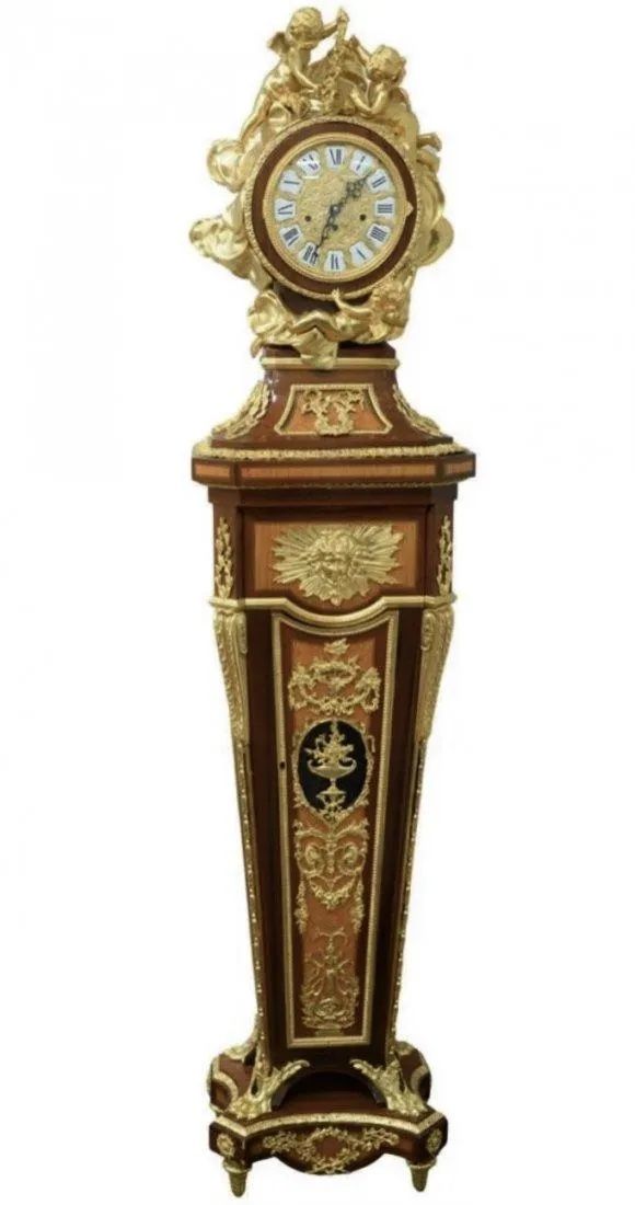 A LOUIS XVI STYLE ORMOLU MOUNTED CLOCK