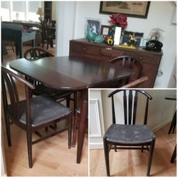 Brand new fold down oak table with four matching chairs