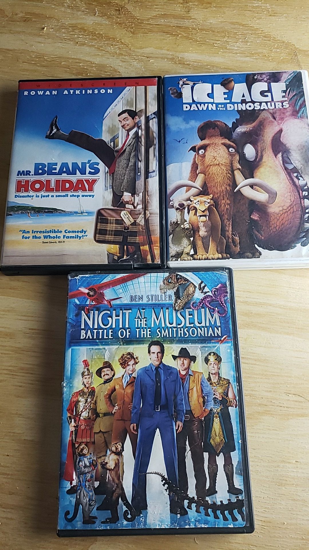 3 Movies DVDs Mr. Bean's Holiday. Night at the Museum Ice Age: Dawn of the Dinosaurs