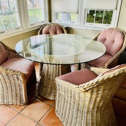 Wicker Round Glass top Table And Four Matching Wicker Chairs. 