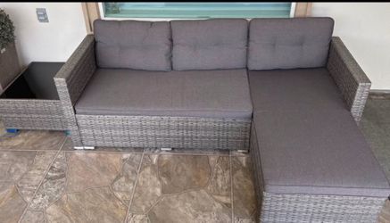 Sectional patio furniture with coffee table