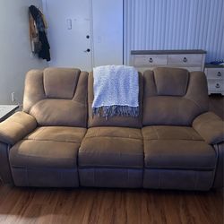 Jeromes Reclining Couch, End Table And Lamp