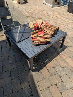 Fire pit table and wood and starter packs