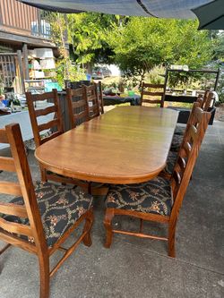 Solid Oak Dining Table w/ 10 matching chairs