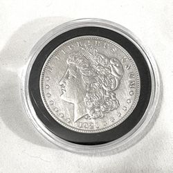 About Uncirculated-AU(50)  1921 Morgan Silver Dollar. Valued $83 On US Coin Book 