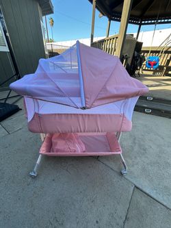 Pink Baby Bassinet with Canopy and Storage