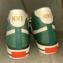 Nike Court Legacy Canvas Mid S50 sneakers in the "Green Noise" and "Sail"