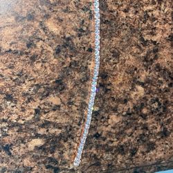 Rose gold moissanite