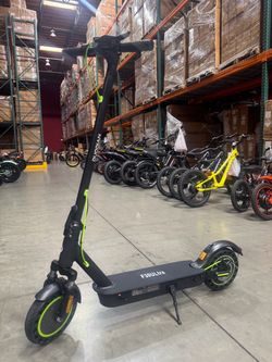 Front and rear shock-absorbing electric scooters