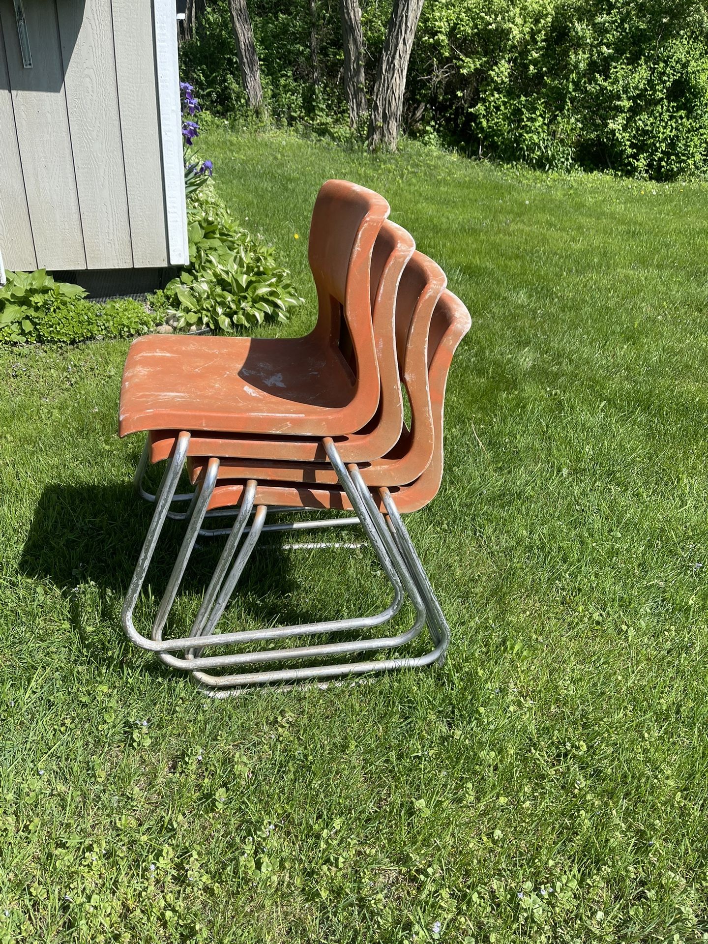 Lot Of 4 Orange Outdoor Stacking Chairs