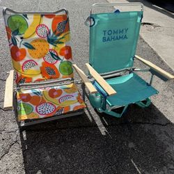 Two sports or beach folding chairs