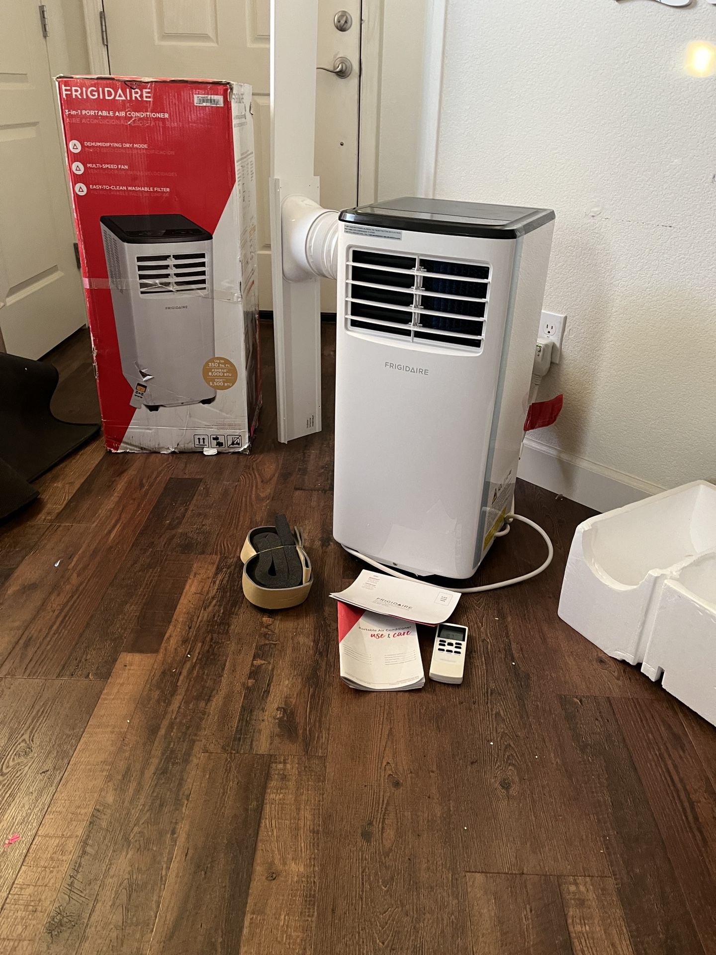 new Frigidaire 8k btu portable ac with Window Mount Exhaust Kit and hose and remote
