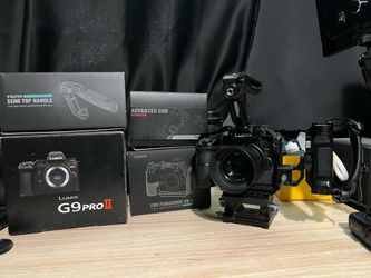 LUMIX g9ii full tilta cage, 25mm f1.7 lens, and battery