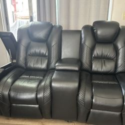 Black Leather Two Seater Recliner 