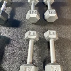 Set of Hex Cast Iron Dumbbells ( light) 12#, 10#, 8# and 5 #   In total: 70 pounds.