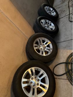 Chevy Silverado/Tahoe OEM Silver Stock Wheels 18”