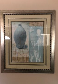 2 large teal and beige framed art