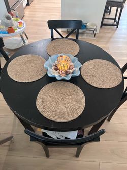Round black table and chairs
