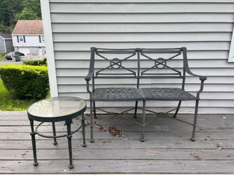 Outdoor Loveseat is crafted from black cast aluminum & outdoor cast aluminum end table