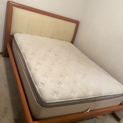 Queen sized bed frame headboard with mattress