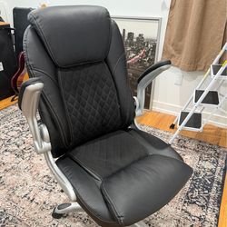 Black Leather Executive Office Chair with Flip-Up Arms