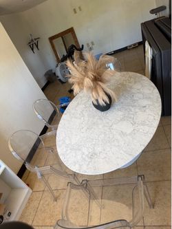 Dinner table with four chairs