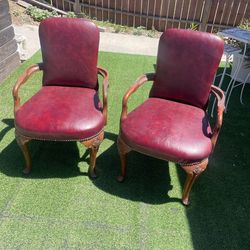 Set of burgundy leather chairs