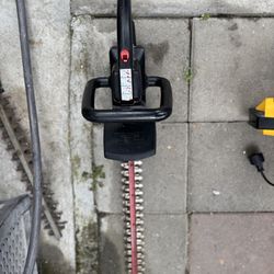 Craftsman Bushwacker electric hedge trimmer.